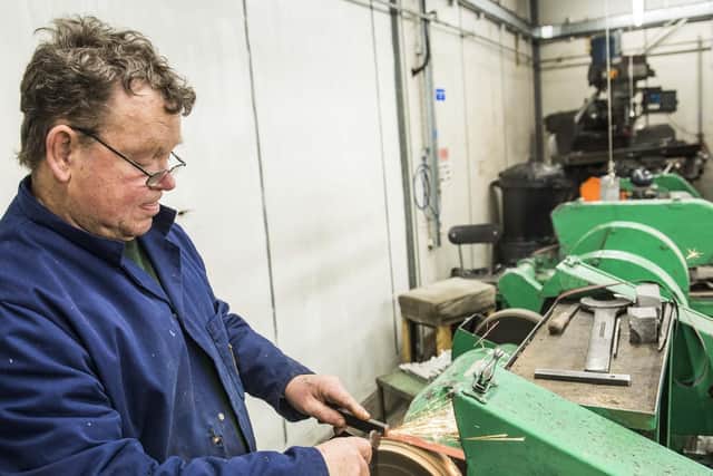 Richard Rawson works on a tuning fork. Picture: Dean Atkins