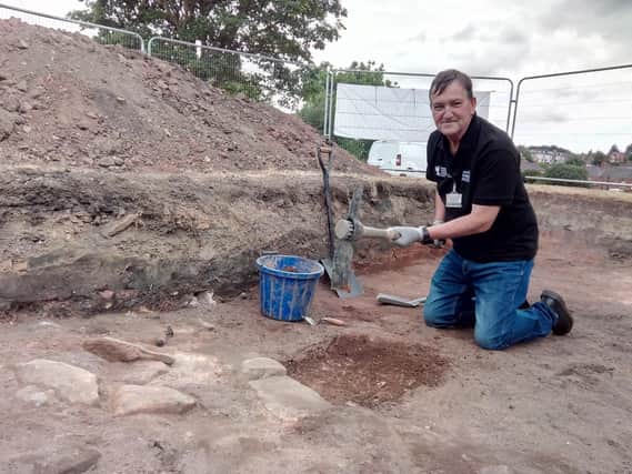 Heritage: Pete Tomlinson takes a break from his day job at Elsecar Heritage Centre to help with excavation work at a community dig at the Forge playing fields.