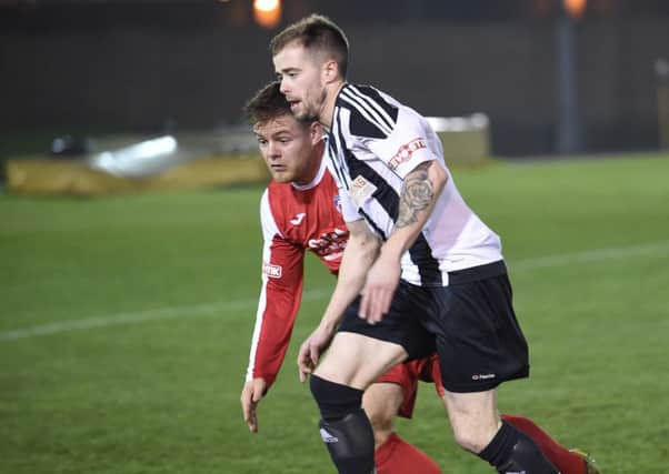 Lee Shaw, in action for former club Grantham Town