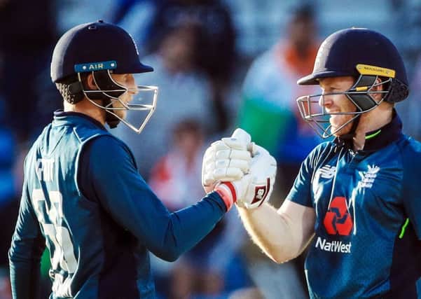 England's Joe Root (left) celebrates making his century to win the match with team mate Eoin Morgan (right) during the third Royal London One Day international at Emerald Headingley, Leeds. Pic: Danny Lawson/PA Wire.