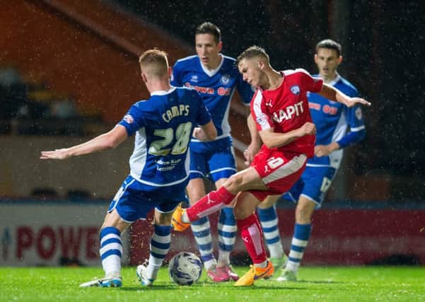 Rochdale vs Chesterfield - Jake Orrel has a shot blocked - Pic By James Williamson