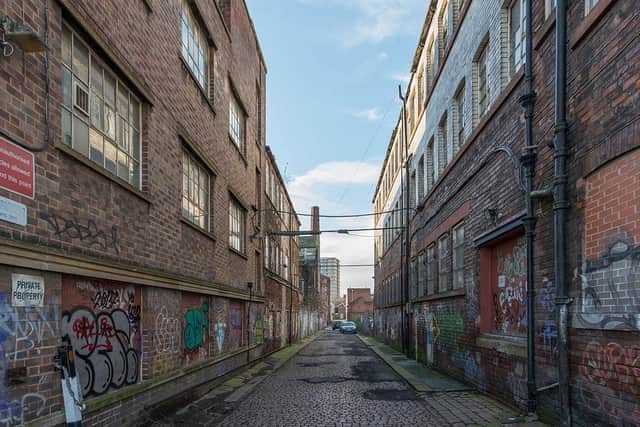 An alley behind Eye Witness Works - the cobbles will be kept and the route could be festooned with lights. Picture: Capital & Centric
