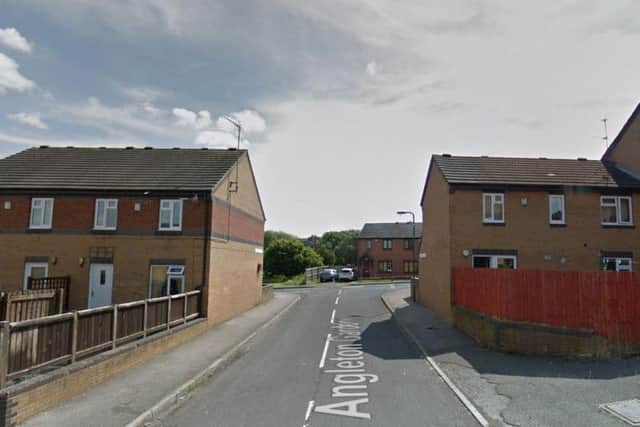 Darren Morton's loaded shotgun was discovered when police raided his home in Angleton Gardens, Manor (pictured) on May 25 this year. Picture: Google Maps