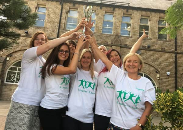 The Workplace Challenges most active workplace was B. Braun Medical Ltd, membersof the team is pictured holding the trophyThe Workplace Challenges most active workplace was B. Braun Medical Ltd, membersof the team is pictured holding the trophy