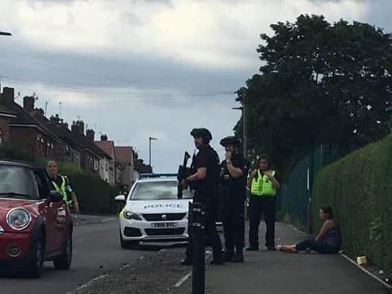 Armed police at the scene yesterday. Picture: Anthony Billings