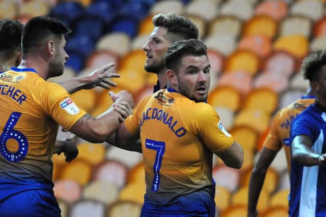 Mansfield Town v Sheffield Wednesday.
Alex McDonald turns peace maker after trouble erupted at the end of the friendly game.
Sam Hutchinson in the thick of things at Mansfield