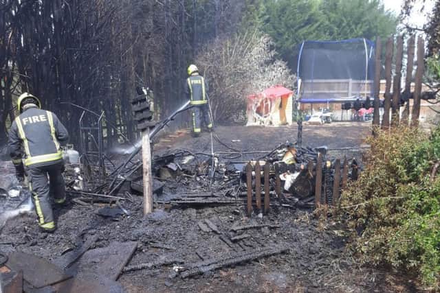 Firefighters at the scene.