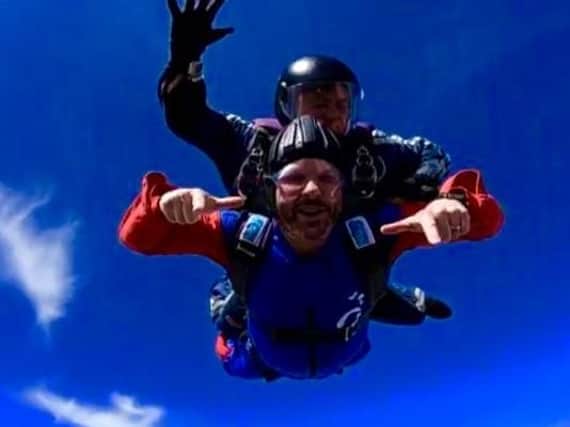 Stephen Culf, pictured with his instructor, during his skydive in aid of the Brendan Ingle Foundation