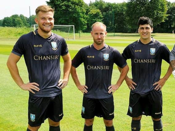 Sheffield Wednesday's new away kit modelled by Owls players Jordan Thorniley, Barry Bannan and Fernando Forestieri