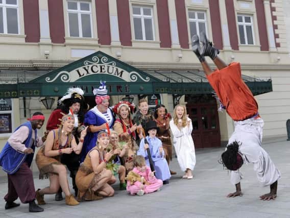 Stars of Peter Pan are amazed by the skills of one of the acrobats in the show