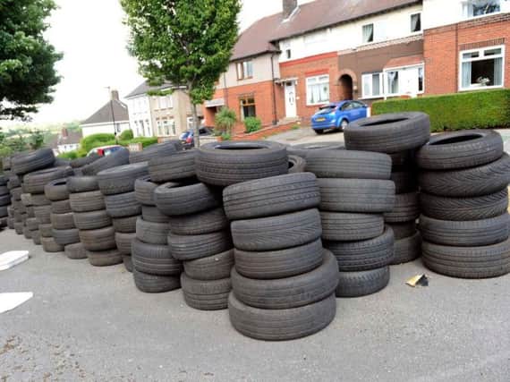 Tyres have been dumped outside a disused Sheffield pub in Shiregreen