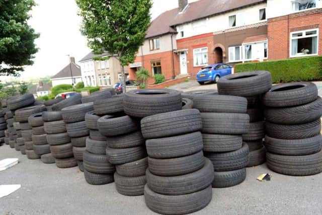 Tyres have been dumped outside a disused Sheffield pub in Shiregreen