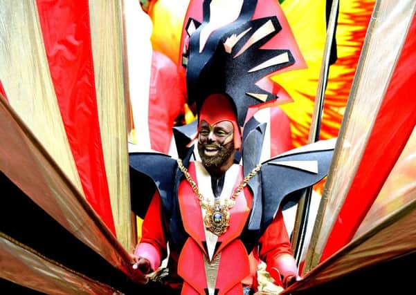 The Lord Mayor of Sheffield Magid Magid leads the 2018 Sheffield Carnival parade through Norfolk Park. Picture Scott Merrylees