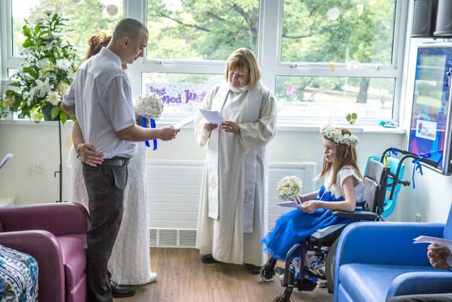 Kayleigh, 11, was only allowed out of her hospital bed for two hours to be bridesmaid at her parents wedding in Doncaster, so staff transformed Ward Six into their reception venue (Picture:Lea Fountain Sheffield Children's Hospital/PA Wire)