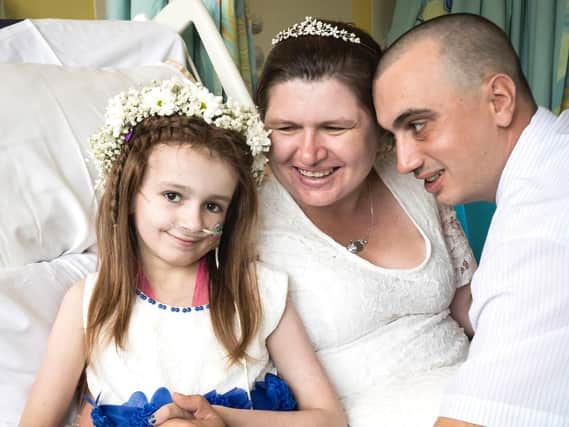 Cancer patient Kayleigh Walsh (left) with her parents Lyndsey and Paul Walsh (Picture: Danny Lawson/PA Wire)