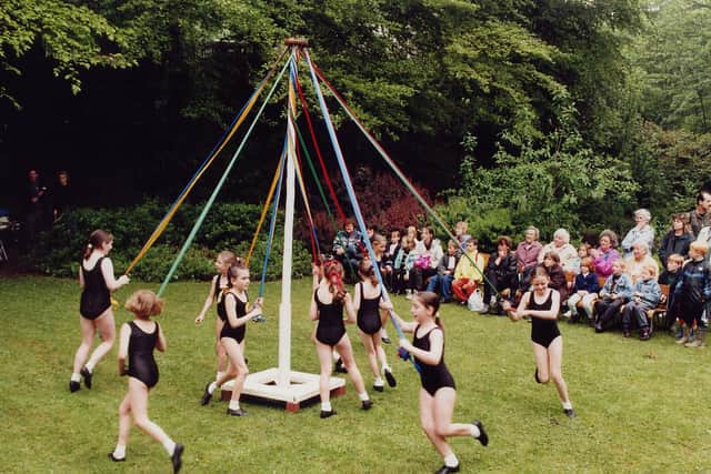Maypole dancing at the Victorian day of celebration when the site reopened in 2002