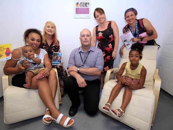 Roxanne Reid, Rhyder Ramsey, aged 17 weeks, Renyeyah Ramsey, six, Coun Jackie Drayton, Coun Dawn Dale, Richard Arnold, acting assistant manager at The Moor Market, and Heather Sawrey from Jessop Wing.