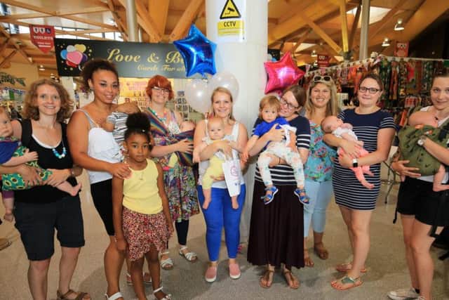 Mothers and their children at the breastfeeding celebratory event at The Moor Market