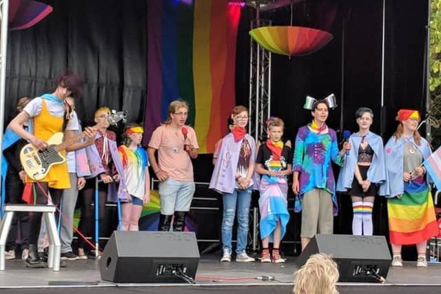 Members of SAYiT on stage performing at Sheffield Pride