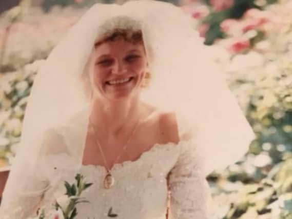 Diane Varley wearing the locket on her wedding day