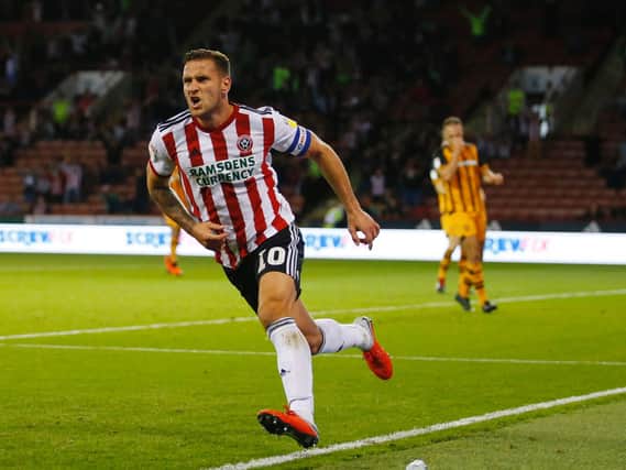 Billy Sharp scored a superb equaliser but was unable to prevent Sheffield United exiting the Carabao Cup on penalties
