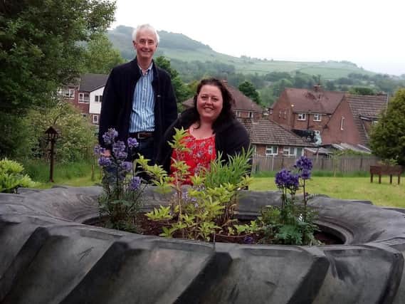 Party time: Residents have been invited to celebrate the opening of Royds Community Garden, seen here with Coun Dave Griffin and volunteer Helen Townend who have both worked on the project.
