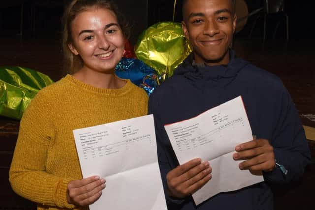 Livvy Robinson, who achieved 3 As, is going to Phil Winston's Theatre Works in Blackpool, and Anthony Windith, who achieved 3 As, on A Level results day at High Storrs School.