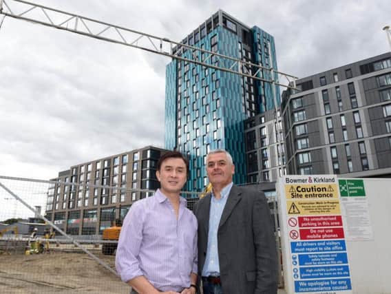 Jerry Cheung and Martin McKervey at the New Era site. Picture: Andrew Roe