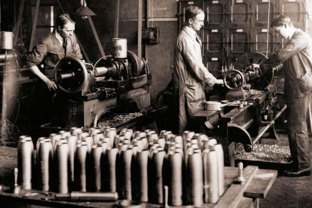 Engineers in 1915, making shells