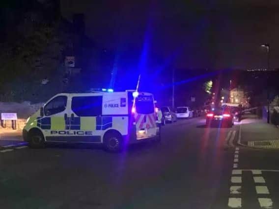 Police at the scene of the crash in Crookesmoor last night