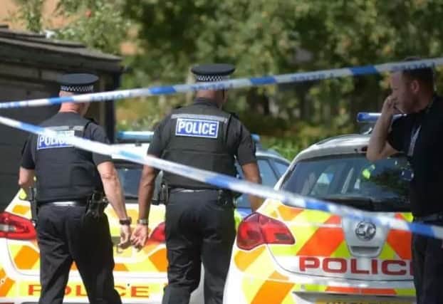 The scene on Langsett Close, Upperthorpe, following the fatal stabbing. Picture: Chris Etchells