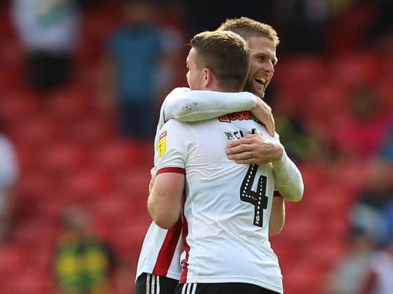 Sheffield United's Oliver Norwood and John Fleck after their side's win over Norwich City on Saturday.