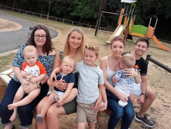 Residents from Woodfield Plantation and Balby Carr are trying to foster a community spirit. Pictured left to right, back, are parents Emma Bentham, Laura Chambers, Rebecca Bradburn and Lewis Hardy; and front, children Thomas Bentham (13 months), Lola Chambers (13 months), Freddie Chambers (five), and Calvin Hardy (two).
Picture: David Kessen