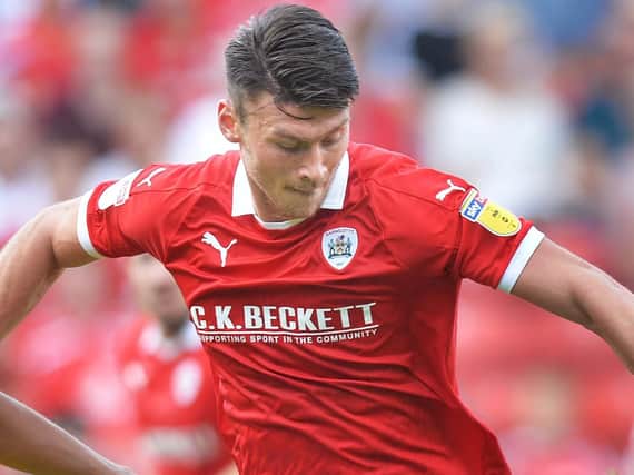 Kieffer Moore scored a hat-trick for Barnsley at Rochdale