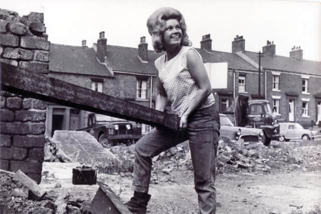 Demolition worker Dorothy Hull at work
