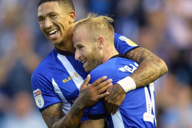 Barry Bannan celebrates his goal with Liam Palmer