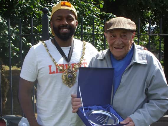 The Lord Mayor Magid Magid and the club secretary Stan Tew with his silver platter (Picture: Neil Fletcher)