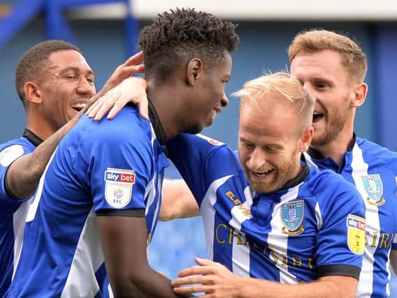 Sheffield Wednesday players celebrate one of two Lucas Joao goals against Ipswich Town