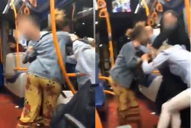 The video shows the women grabbing another passenger by the hair as other bus users try to pull her off.