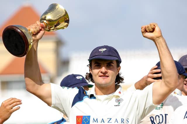 Yorkshire's Jack Brooks celebrates with the County Championship trophy in 2014