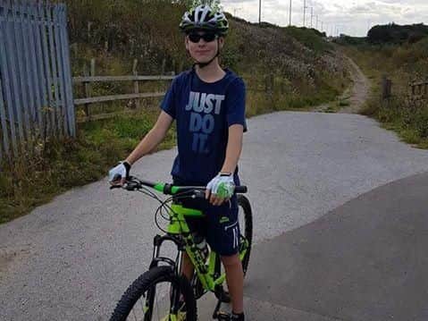 Ben with the bike which was stolen