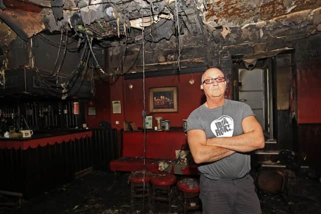 Sean Fogg in the more modern bar area of Carbrook Hall, which was worst damaged by the fire in April