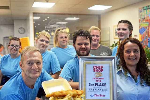 Owners Richard and Nicola Pearce, pictured with their son Tom and staff members at Frymaster Fish and Chip Restaurant. Picture: Marie Caley NDFP-24-08-18-Frymaster-1
