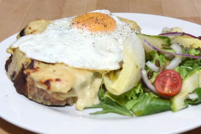 Rarebit with a fried egg and salad at Seven Hills Bakery.