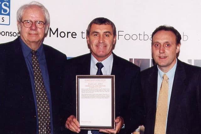 Granville Grayson and son John, with England great Peter Shilton