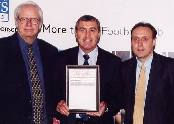 Granville Grayson and son John, with England great Peter Shilton