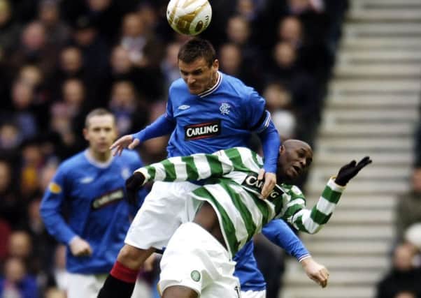 GLASGOW. IBROX STADIUM 12.30 PM KICK OFF

RANGERS V CELTIC.

   rangers lee mcculloch wins the ball in the air from marc-antoine fortune
     PHOTO PHIL WILKINSON / TSPL