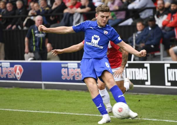 ChesterfieldÃ¢Â¬"s Laurence Maguire crosses the ball: Picture by Steve Flynn/AHPIX.com, Football: Vanarama National League match Salford City -V- Chesterfield at Peninsula Stadium, Salford, Greater Manchester, England copyright picture Howard Roe 07973 739229