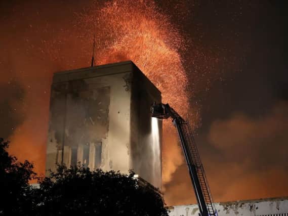 Firefighters battle a huge blaze at the Littlewoods Building in Edge Lane, Liverpool. Photo: Peter Byrne/PA Wire