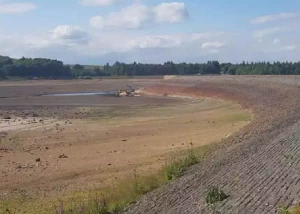 The drained reservoir at Redmires.